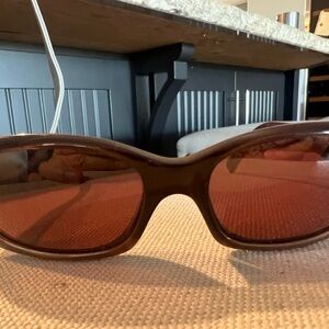 Stylish Brown Sunglasses with Red Lenses